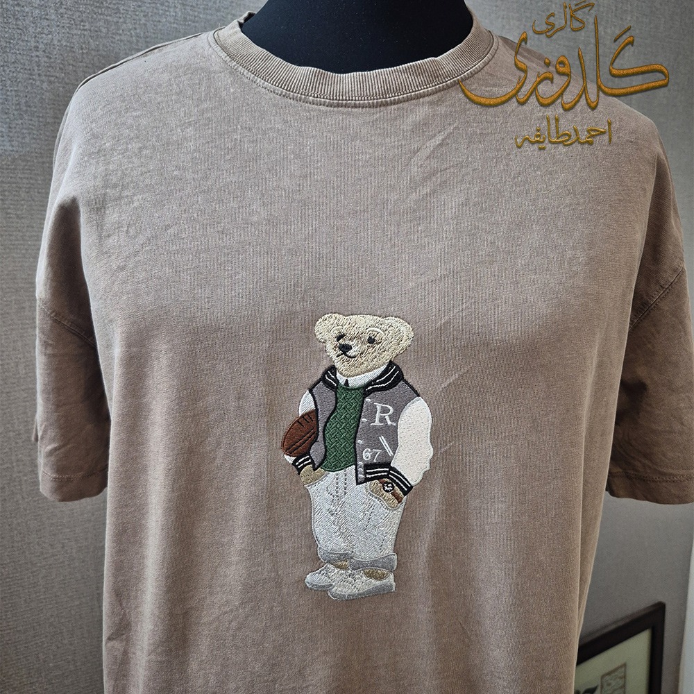 گلدوزی تدی روی پیراهن گلدوزی تدی روی پیراهن
